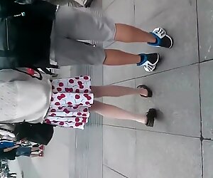 The Chinese hot teen in white stockings got upskirted