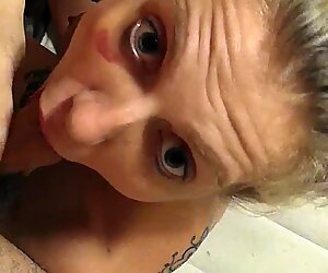 Young blonde milf gives young stud blowjob and loves it